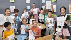 Ayvalık’ta minik sanatçılar karikatür atölyesinde buluştu