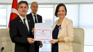 TEMAD’dan Başkan Kınay’a onursal berat